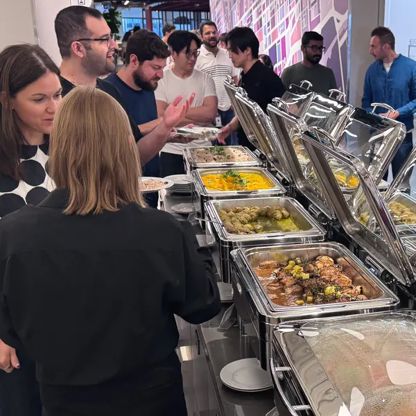 Guests choosing lunch from a Cleese buffet